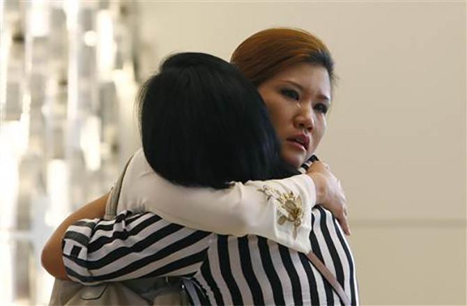 Relatives of a passenger onboard the Malaysia Airlines flight MH370 that disappeared in March.