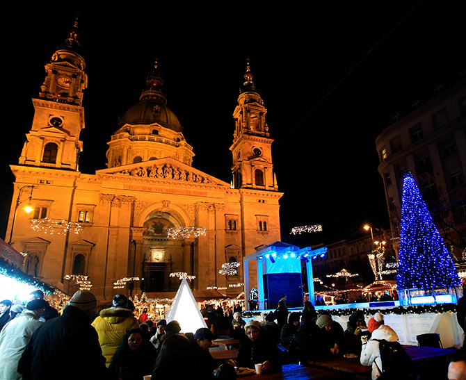 St. Stephens' Basilica is pictured behind a Christmas market in downtown Budapest.