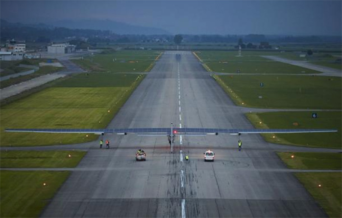 German test pilot Markus Scherdel prepares for take-off in the solar-powered Solar Impulse 2 aircraft on its maiden flight at its base in Payerne.