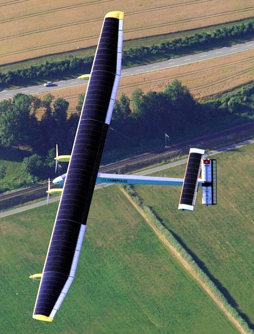 Solar Impulse's Chief Executive Officer and pilot Andre Borschberg flies in the solar-powered HB-SIA prototype airplane during its first successful night flight attempt at Payerne airport.