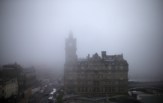 Fog surrounds the Balmoral Hotel in Edinburgh, Scotland.