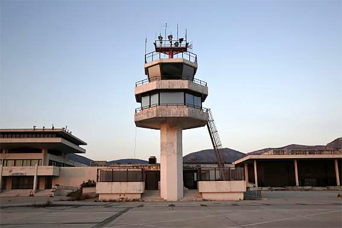  An auxiliary control tower stands in front of the east terminal of Hellenikon.
