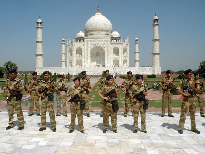 India's paramilitary troopers stand guard inside the historic Taj Mahal.
