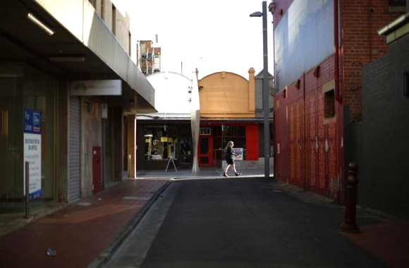 A woman walks through the main shopping district in Geelong.