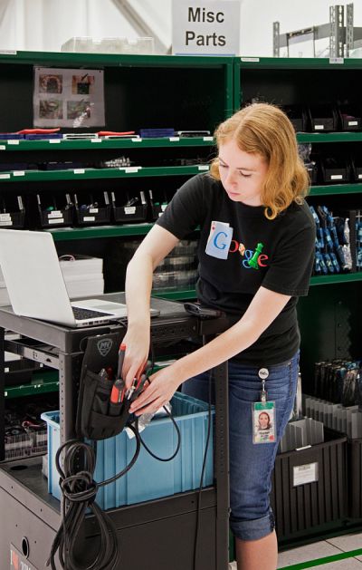 Rachel Mitchell preps a cart to repair the servers that store Google's corner of the Internet.