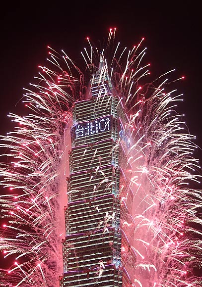 Fireworks explode from Taiwan's tallest skyscraper, the Taipei 101 during New Year celebrations in Taipei.