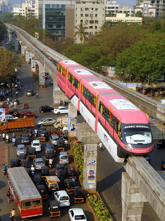Monorail is seen against the skyline of Mumbai.