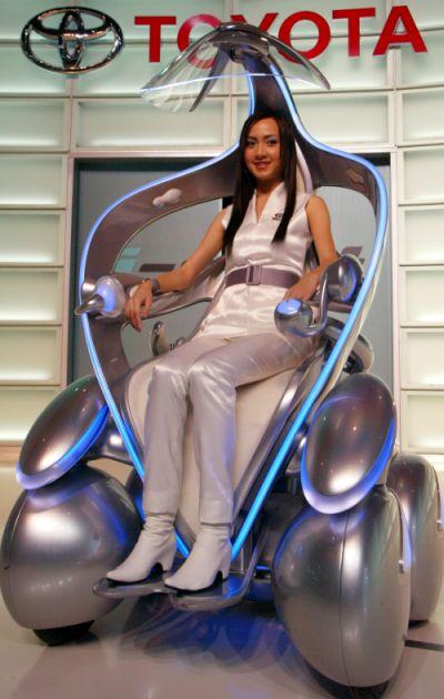 A Thai model presents the latest design of Toyota's i-unit.