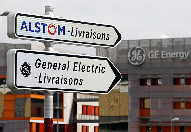 Road signs indicate directions for deliveries to French power and transport engineering company Alstom and U.S. conglomerate General Electric sites in Belfort.