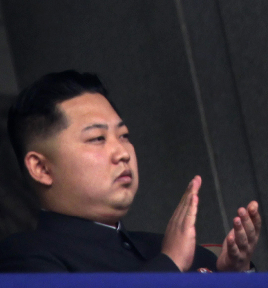 Kim Jong-un, the youngest son of North Korean leader Kim Jong-il, applauds during a military parade.