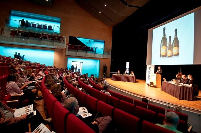 Participants attend an auction for eleven bottles of champagne from the early part of the 19th century, which were found in a shipwreck discovered in the archipelago of Aland Islands, in Mariehamn.