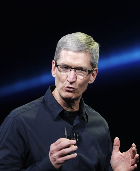 Apple CEO Tim Cook speaks on stage during an Apple event introducing the new iPad.