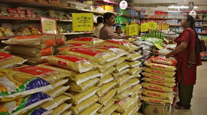 Customers shop at a superstore inside a mall in Allahabad.