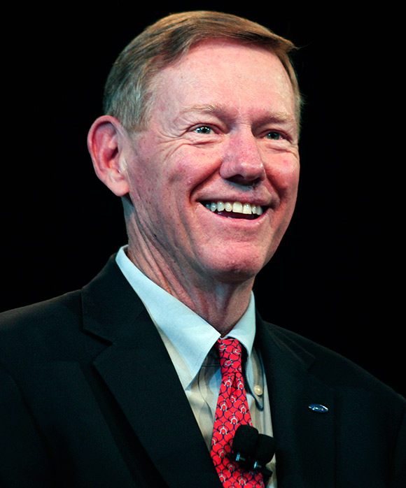 Ford President and CEO Alan Mulally attends a press conference.
