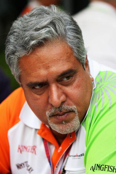 Vijay Mallya is interviewed by the media following qualifying for the Indian Formula One Grand Prix at the Buddh International Circuit.