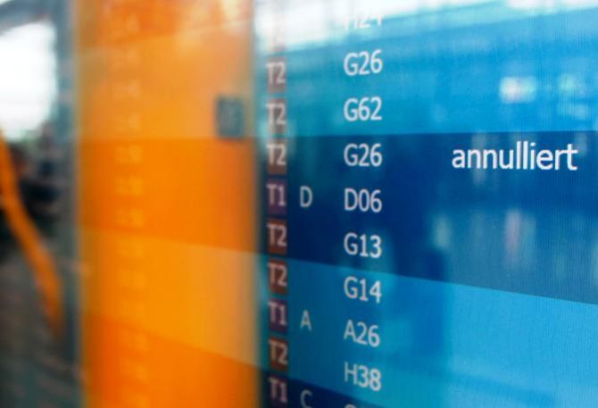 Cancelled flights of German airline Lufthansa are displayed on a flight schedule board during a pilots' strike at Munich's airport on September 10, 2014.