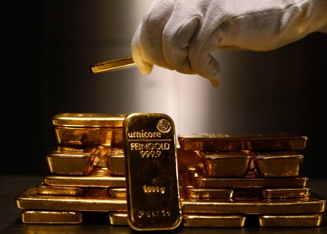 Gold bars are stacked in the safe deposit boxes room of the Pro Aurum gold house in Munich.