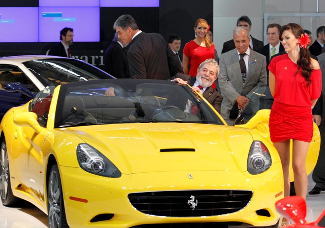 This file photo shows Brazil's former President Luiz Inacio Lula da Silva entering a Ferrari California car.