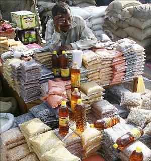 Image: A salesman waits for customers at a grocery wholesale market in Chandigarh. Photograph: Ajay Verma/Reuters