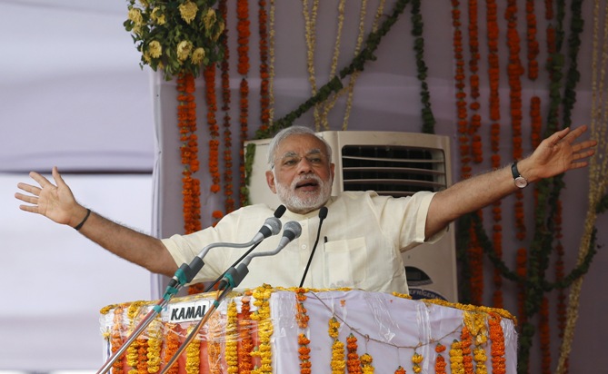 Image: Prime Minister Narendra Modi addresses his supporters during a rally in Mathura, May 25, 2015.  Photograph:  Adnan Abidi/Reuters