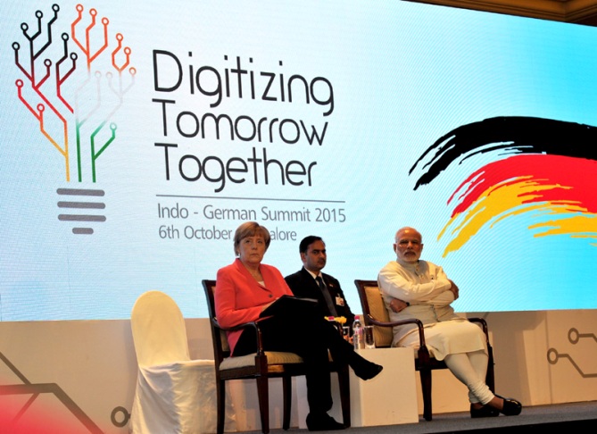 Prime Minister Narendra Modi and German Chancellor Angela Merkel at the Indo-German Summit 2015, organised by the NASSCOM & Frauenhofer Institute, in Bengaluru on October 06, 2015.