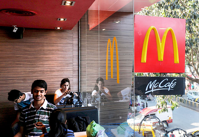 Visitors are seen at a McDonald's restaurant in Mumbai February 10, 2015. Photo: Shailesh Andrade/Reuters 
