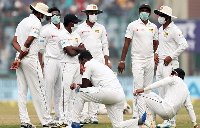 Sri Lankan cricketers wear masks during a recent match in Delhi