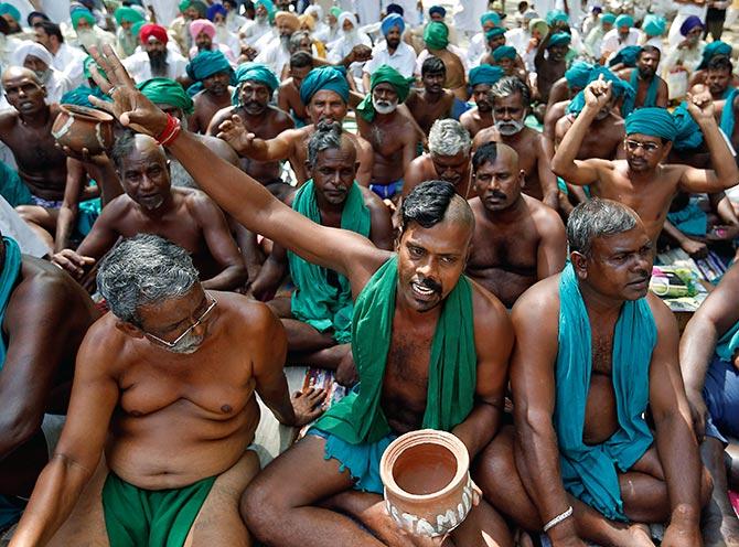 Farmers from Tamil Nadu pose half shaved during a protest demanding a drought-relief package from the Union government, in New Delhi, April 3, 2017. Photograph: Cathal McNaughton/Reuters