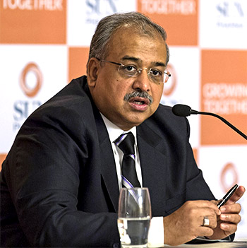 Managing Director of Sun Pharmaceutical Industries Ltd, Dilip Shanghvi, speaks during a news conference in Mumbai March 25, 2015. Sun Pharmaceutical Industries Ltd, India's largest drugmaker by sales, said on Wednesday its $3.2 billion acquisition of smaller rival Ranbaxy Laboratories Ltd will not restrict it from making further large acquisitions. Photo: Danish Siddiqui/Reuters
