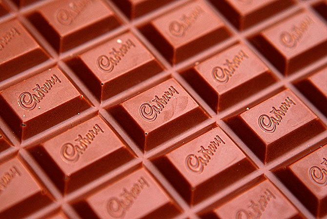 The Cadbury name is seen on a bar of Dairy Milk chocolate in this photo Illustration taken in Manchester, northern England, on January 19, 2010. Kraft Foods was close to announcing a recommended deal to buy Cadbury for around 11.7 billion pounds ($19.2 billion) after it offered more cash in late-night talks to break a four-month impasse over price. Photo: Phil Noble/Reuters