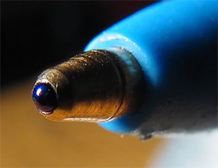 Definition of a ballpoint pen: a pen having as the writing point a small rotating metal ball that inks itself by contact with an inner magazine.