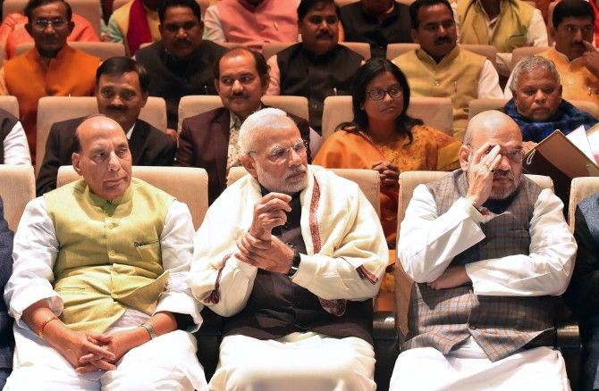 Prime Minister Narendra D Modi -- flanked by Bharatiya Janata Party President Amit A Shah, to his left, and Home Minister Rajnath Singh -- at the BJP Parliamentary Party meeting in New Delhi, February 1, 2018. Photograph: Atul Yadav/PTI Photo