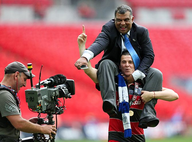 Queens Park Rangers Joey Barton and chairman Tony Fernandes celebrate after winning the Football League Championship Play Off final. Photograph: Action Images/Matthew Childs.