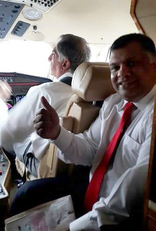 AirAsia group CEO Tony Fernandes captioned this 2013 picture as: "My new Pilot Sir Ratan Tata flying me to Delhi. Another way airasia cuts costs. The advisor is a pilot." Photograph: Courtesy @tonyfernandes/Twitter.