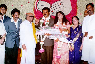 Karunanidhi greeting the couple