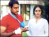 Ajay Devgan and Gracy Singh in Gangaajal