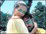 Neha Dhupia, Ajay Devgan in Qayamat