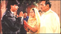Shah Rukh Khan, Kajol and Amrish Puri in DDLJ