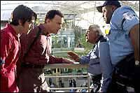 Diego Luna, Tom Hanks, Kumar Pallana and Chi McBride in DreamWorks' The Terminal - 2004.