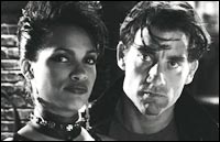 Rosario Dawson and Clive Owen in Sin City