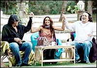 Amrita Arora with Abu Jani and Sandeep Khosla