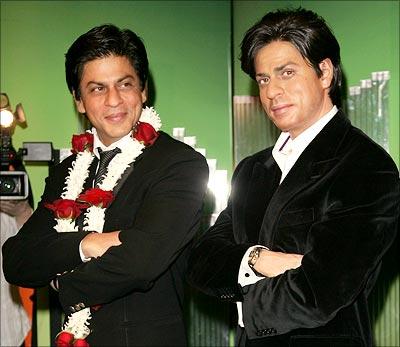 Shah Rukh Khan poses next to his newly unveiled waxwork at Madame Tussaud's, London