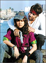 Ajay Devgan and Nisha Kothari in a still from the film.