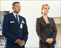 Terrence Howard and Gwyneth Paltrow in Iron Man