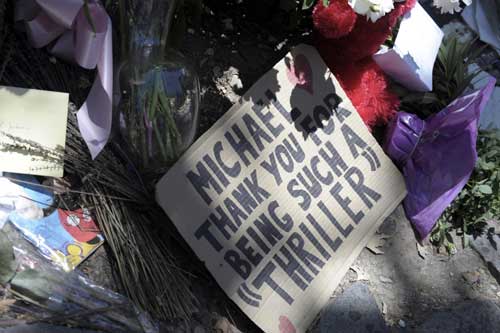 Memorials to pop star Michael Jackson are seen outside the gates of Neverland Ranch in Los Olivos, California on July 1, 2009
