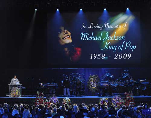 Musician Smokey Robinson speaks during the memorial service for Michael Jackson at the Staples Center in Los Angeles