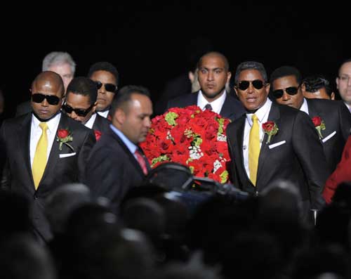 Jackson Brothers accompany the casket during memorial service for Michael Jackson at the Staples Center in Los Angeles