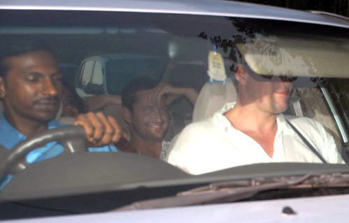 Gerard Butler (in the back seat)