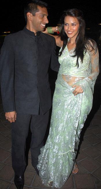 Ritwik Bhattacharya and Neha Dhupia