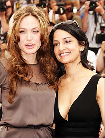 Angelina Jolie and Archie Panjabi. Prev Next